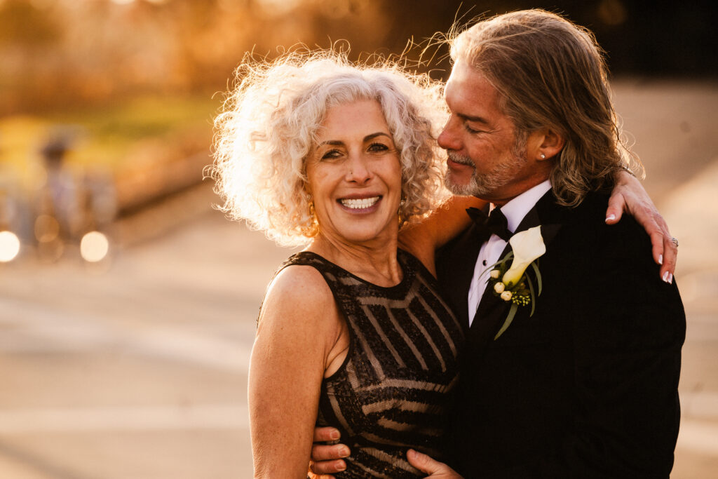 Mature bride and groom outside Philadelphia's Museum of Art